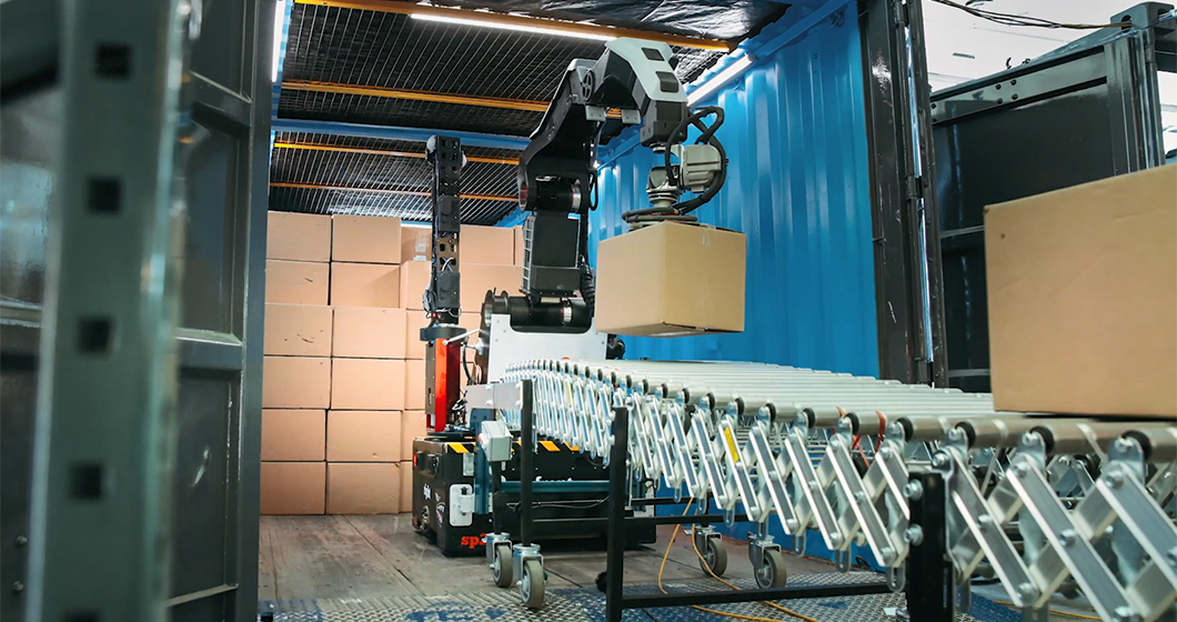 The Stretch robot unloads boxes from a cargo container.